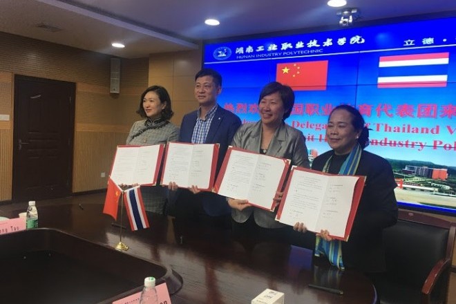 The Signing of Memorandum of Understanding  on Robots among Institute of Vocational Education, Bangkok;  Kanchanaphisek Technical College, Mahanakorn, Thailand;   Hunan Industry Polytechnic; and Tang Chinese Education Group, China